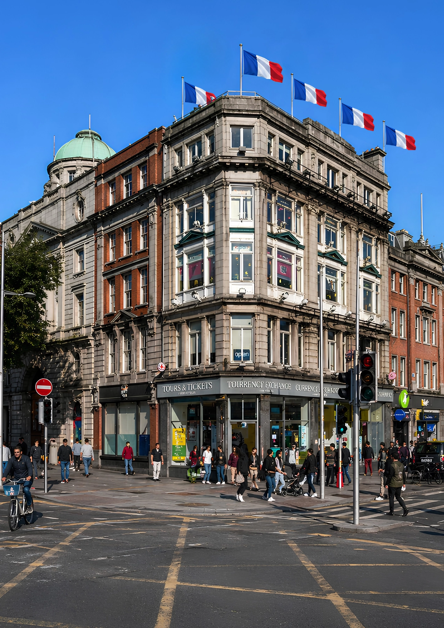 Tcube building with French flags on O'Connell Bridge